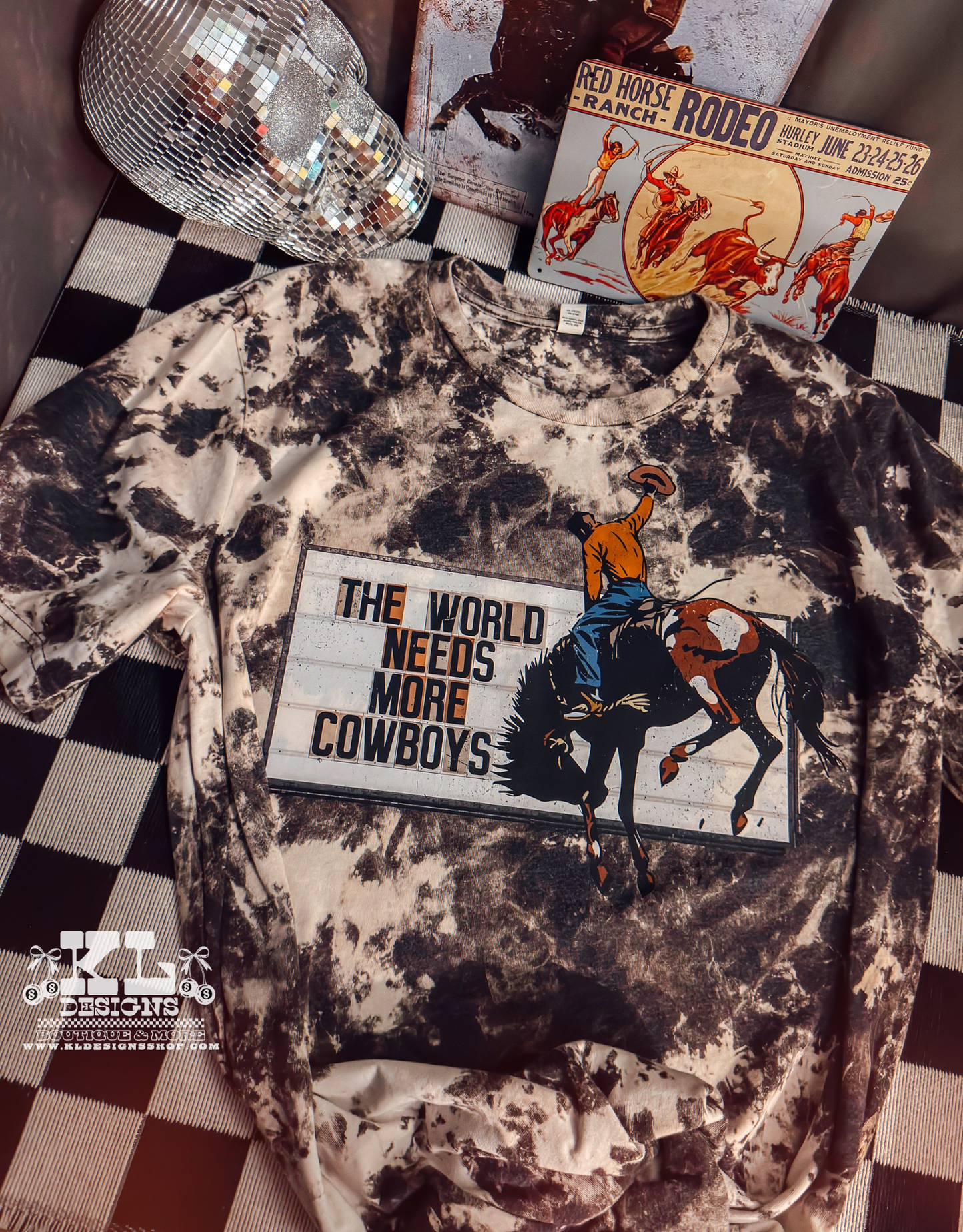 The World Needs More Cowboys Bleached Tee