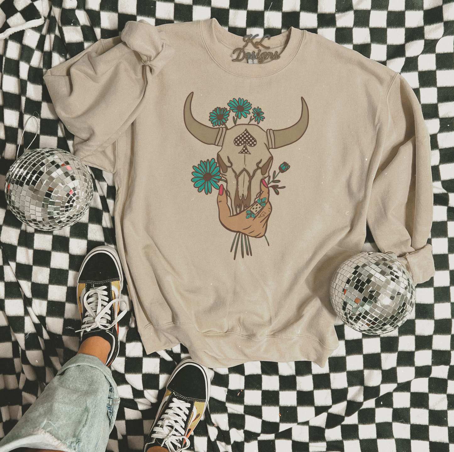 Daisy Spade Bull Skull